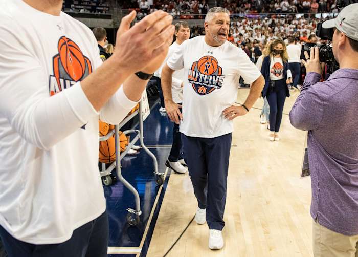 Auburn Tigers head coach Bruce Pearl walks the court before Auburn Tigers men's basketball takes on Texas A&M Aggies at Auburn Arena in Auburn, Ala., on Saturday, Feb. 12, 2022. Auburn Tigers lead Texas A&M Aggies 33-18 at halftime.